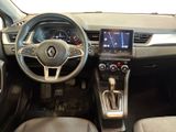 a picture of the interior of a car with a steering wheel