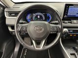 the interior of a car with a steering wheel and dashboard controls