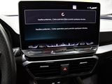 a picture of a car dashboard with a laptop on it