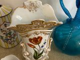 many different vases and vases on the table