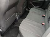 the back seats of a car are empty with no one in it
