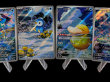 several pokemon cards are lined up in a row on a black background