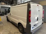 a white van that is parked in a garage