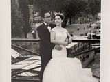 black and white photograph of a bride and groom posing for a picture