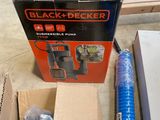 a box of black decker water pumps on the floor