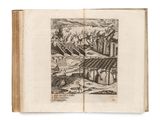 an old book with a drawing of a city on it