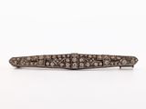 an antique silver and diamond broochle broochle