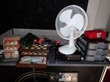 a fan that is sitting on top of a table