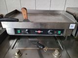 an image of a commercial fryer in a commercial kitchen