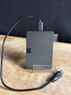 an external hard drive with a usb cable connected to it