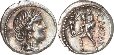 a silver coin with an image of a woman on it