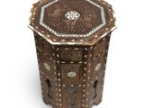 an image of a wooden table with a decorative design on it