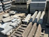 a pile of concrete blocks sitting on a pallet