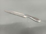 a knife that is sitting on a table