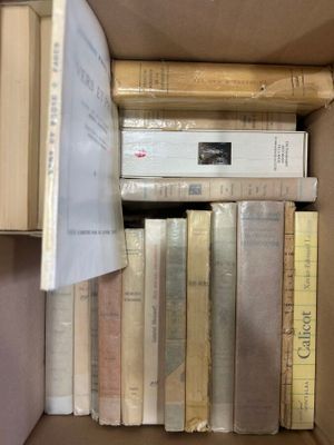 a box full of books sitting on a table