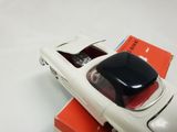 a toy car that is sitting on top of a box