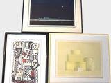 three framed art pieces of various shapes and sizes on a white wall