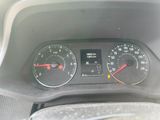 a close up of a car dashboard with a speedometer and gauges