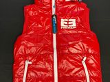 the vest is red and white and has a hood on it