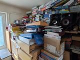 a room with a lot of books on the shelves