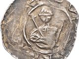 a close up of a coin with a man on it