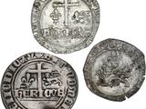 trois pièces d'argent, dont l'une porte une croix et l'autre une croix gravée dessus