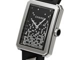 a black and silver watch on a black leather strap