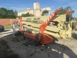 a crane that is sitting in the dirt