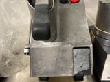 a silver machine that is sitting on a table