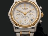 une image d'un gros plan d'une montre-bracelet sur une surface noire