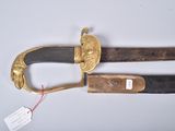 pair of old and worn swords on a white surface