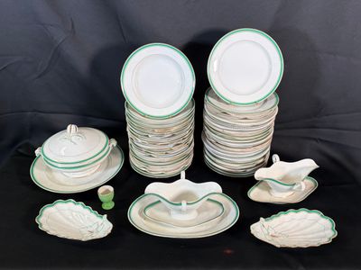 a lot of plates and bowls on the table