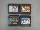 three nintendo gameboy games sitting on top of a table