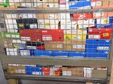 a cart full of boxes and boxes sitting on the floor