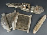 two pieces of wood that have been carved into the shape of a boat