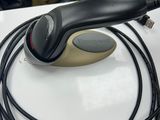 a computer mouse sitting on top of a white table