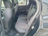 the back seats of a car are empty in the parking lot