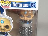 a box with a toy figure in it and a box with a toy figure in it