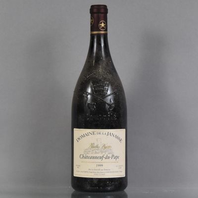 a close up of a bottle of wine on a table