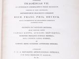 an open book with a black and white title on it