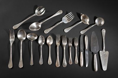 a lot of spoons and forks on a black table