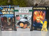quatre DVD de « Star Wars » posés les uns à côté des autres sur une table