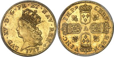 une pièce souveraine en or surmontée d'une couronne