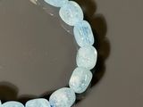 bracelet made of blue glass beads with a silver clasp