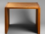 an image of a wooden table on a grey background