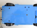 underside view of a blue toy car with four wheels and a blue box