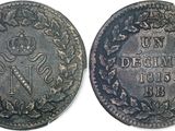 a close up of a coin with a crown on it