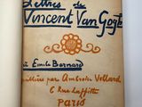 an open book with an orange and blue design on it