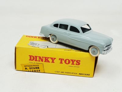 a toy car that is sitting on top of a box