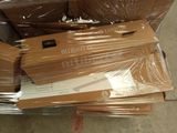 a pile of boxes that have been wrapped in plastic
